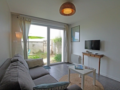 Salon chaleureux et lumineux